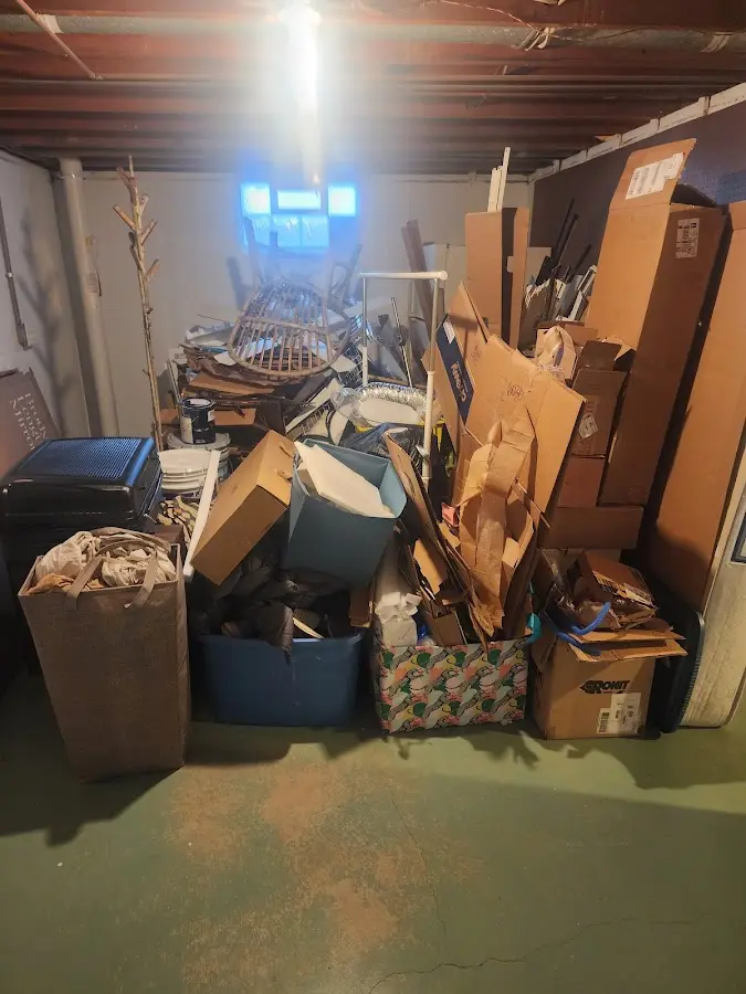 Roll-off dumpster container at job site for Construction Dumpster Rental in Norwich